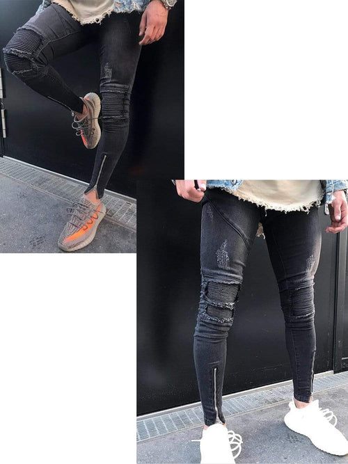 Biker jeans with zippers and rips on sale
